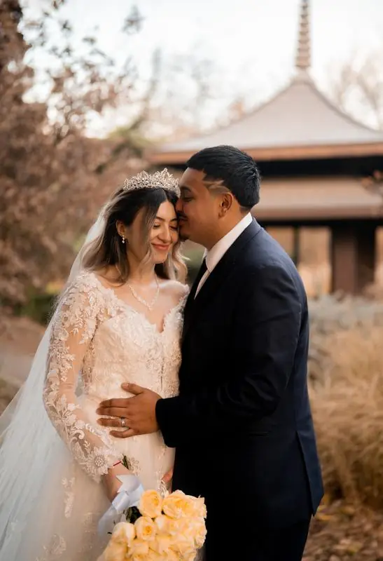 Bride and groom embracing