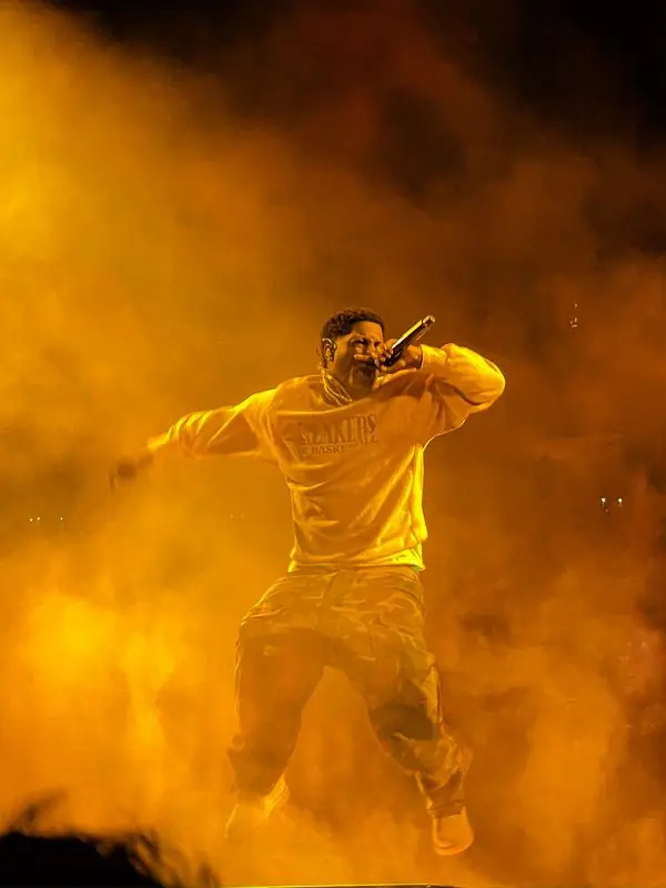 Performer jumping in orange smoke